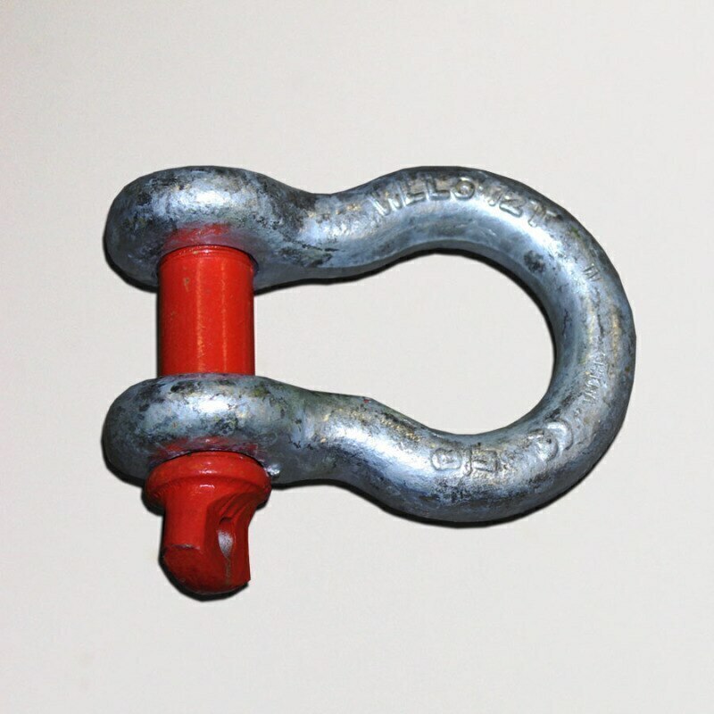 A silver-colored screw pin shackle with a red collar on the pin.