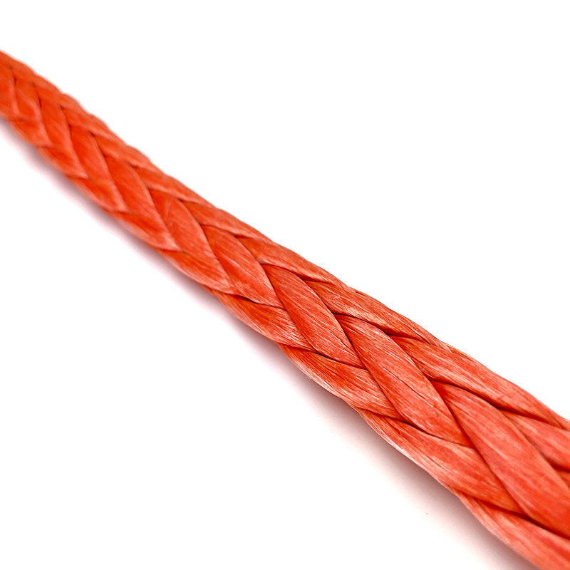 Close-up of an orange synthetic winch line made from high modulus polyethylene fibers.