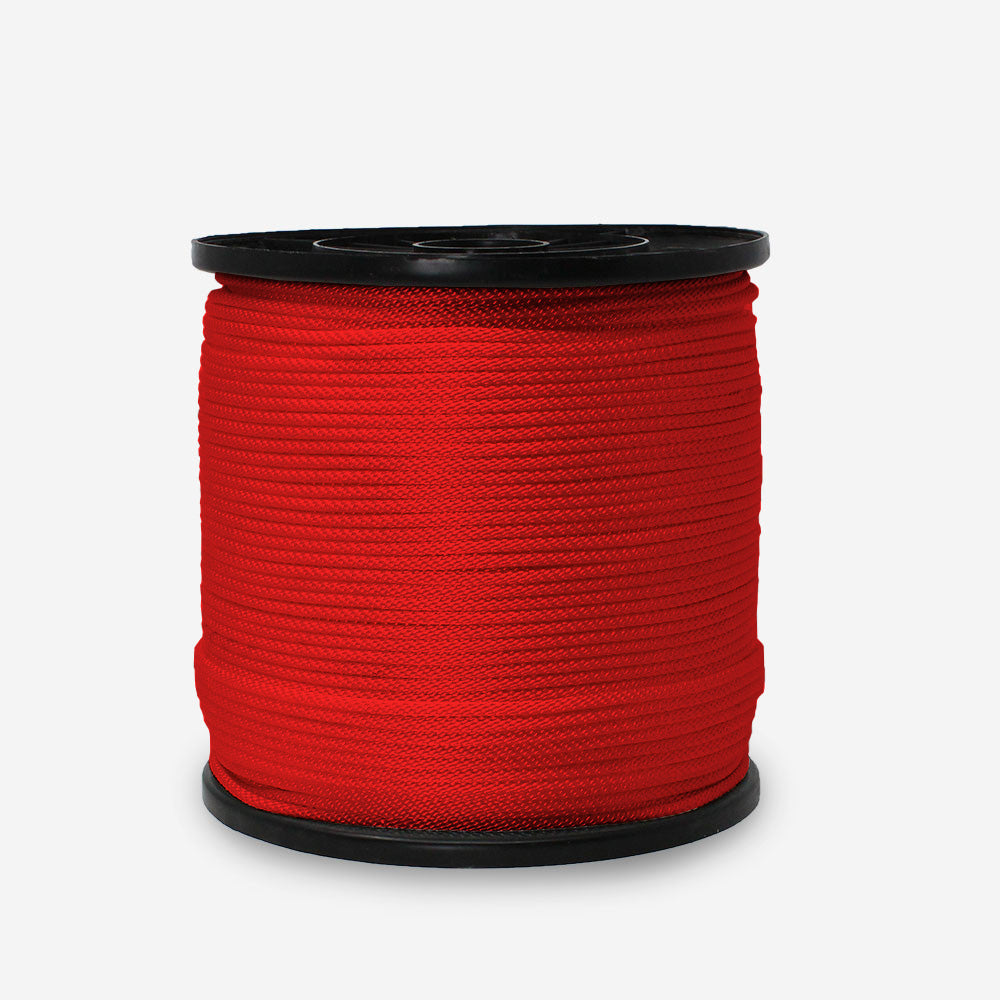 A spool of red solid braid nylon rope.