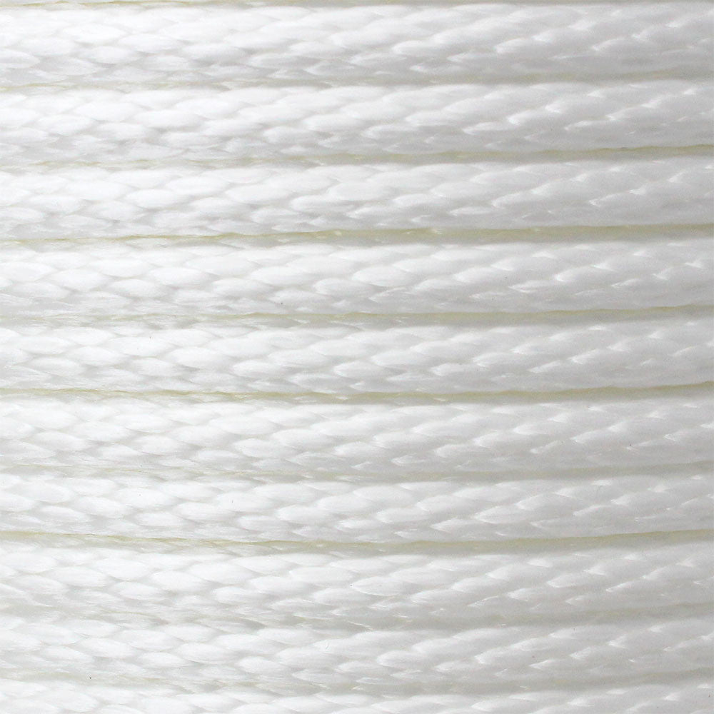 A close-up image of a white solid braid polyester rope showing its texture and weave.