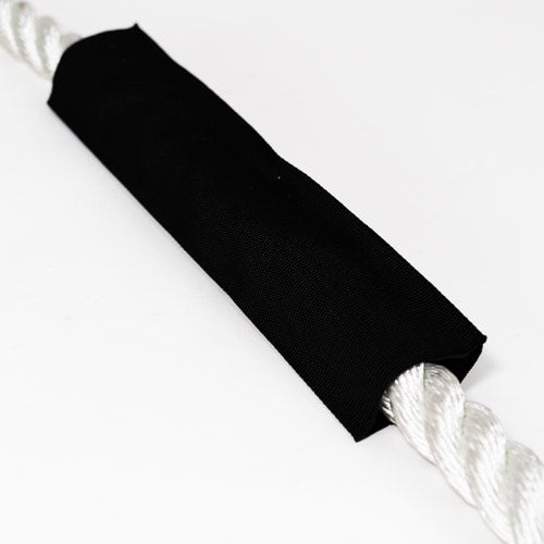 A black nylon sleeve fitted over a white rope, showing the product's use in protecting the rope from abrasion.